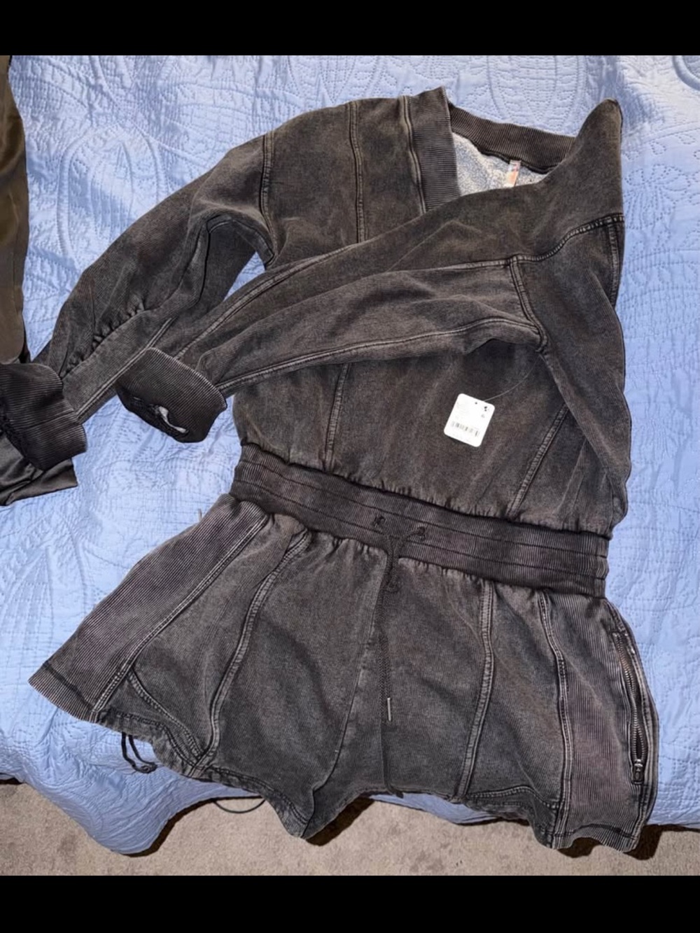 Free People movement black romper. Brand new with tags.